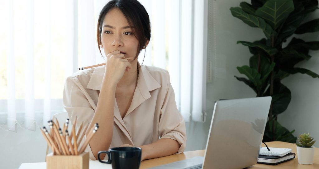 Woman reflecting over important life decision